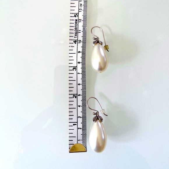 BUY OR BUNDLE FOR FREE WITH $125. Purchase. Pearl & Silver leaf Earrings - Picture 4 of 4